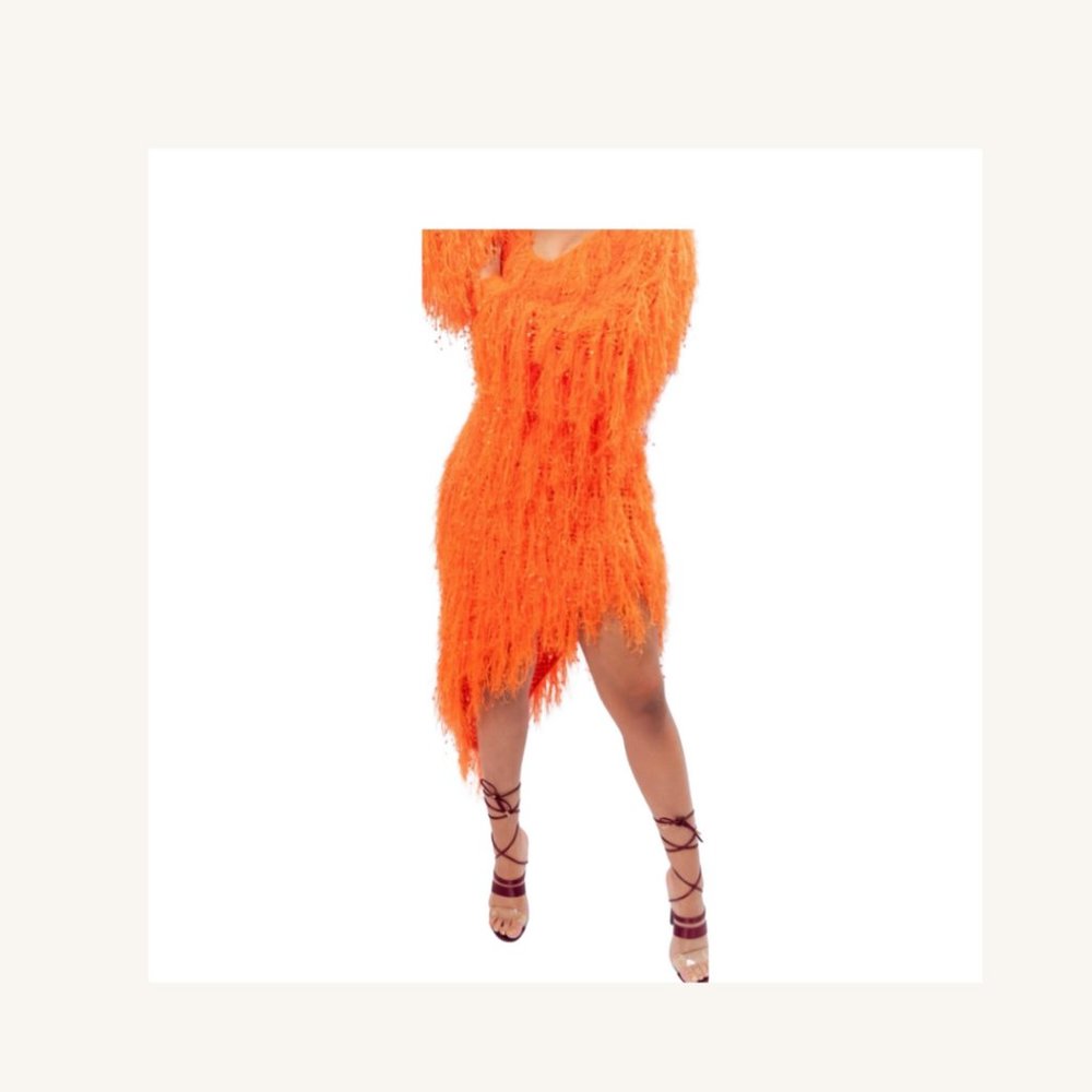 Asymmetrical light weight feathered beaded dress